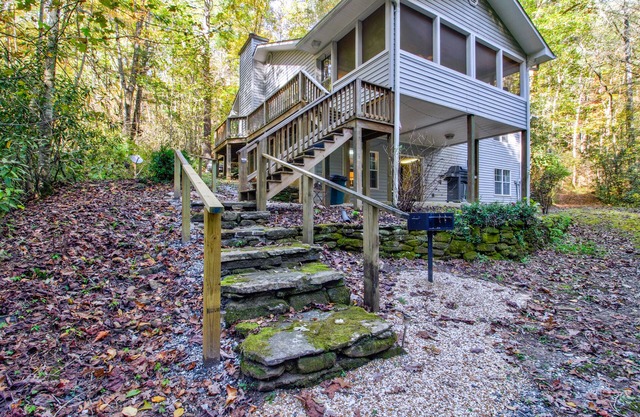 Dog-friendly creekfront cabin on 2.5 wooded acres with game room, screened porch