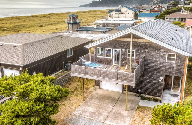 Dog-friendly home with ocean views, deck, hammock, gas grill & gas fireplace