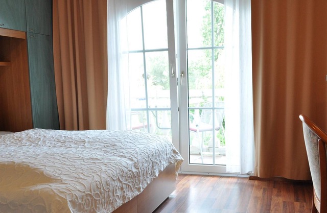 Doppelzimmer, Balkon, Seitlicher Seeblick - Seehotel Herlinde