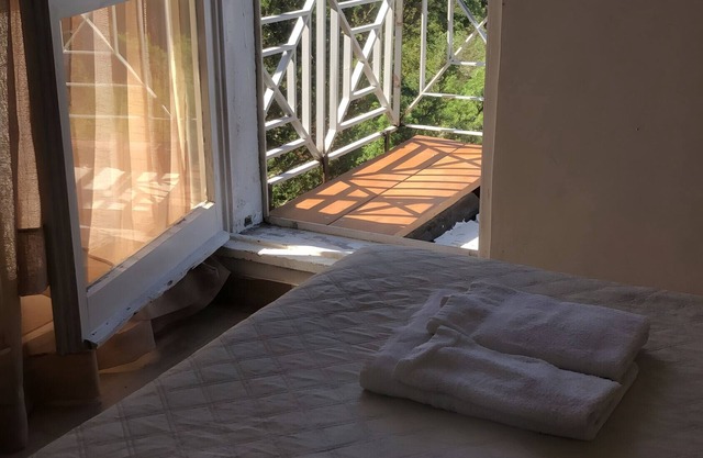 'Double Room with Sea View' with sea view, shared pool and private terrace