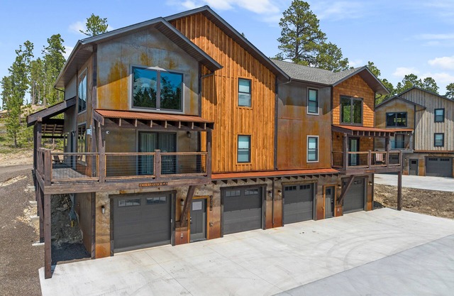 Duplex in popular development, outdoor pool access, paved roads, lots of parking