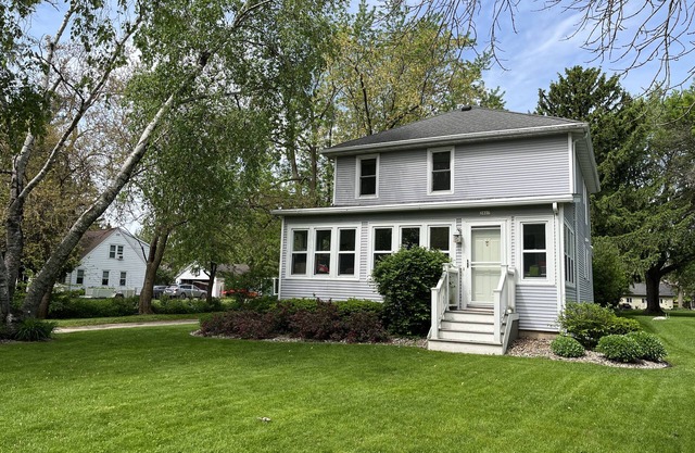 EAA rental near airport w/firepit, backyard, peekaboo lake view, and a clear sky