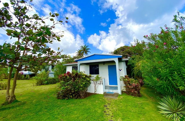 Eco-Cottage 1-bed set in tropical gardens