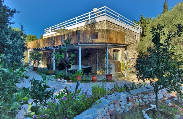 Eco Secluded hand built stone house in an oasis