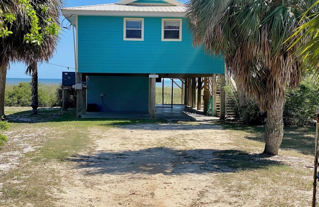 Enchanted Cottage Beachfront – Charming Retreat by the Sea!