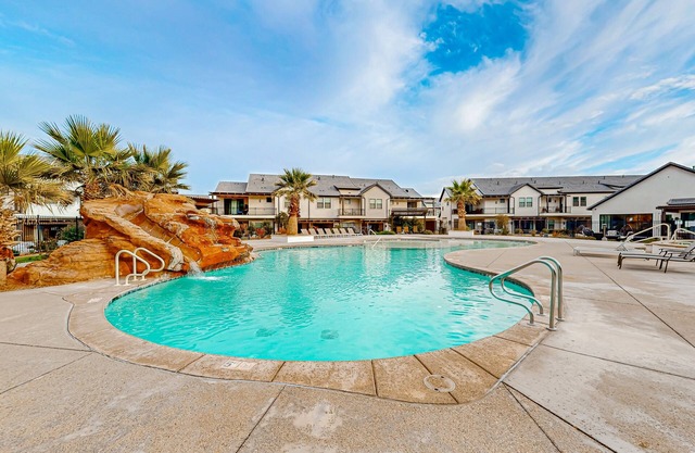 Enchanting townhome with pool, hot tub, fire pit, games, & great balcony views