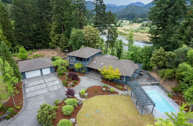 Enjoy the Serenity on this 5-acre multi-unit Estate with 1 bdr suite pool house