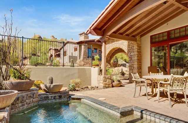 Enjoy the sunny AZ from this luxurious North Scottsdale Villa near Troon Golf