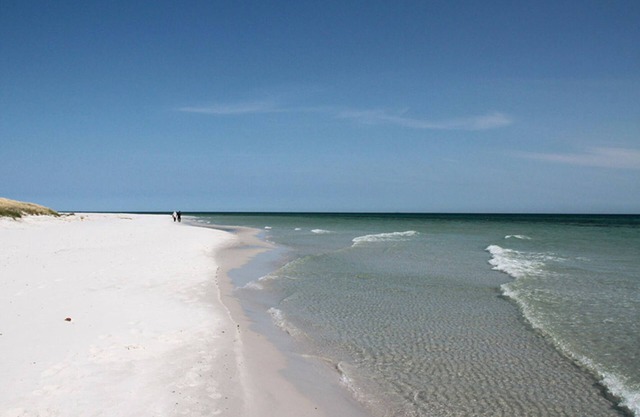 Enjoy the sunset above the fields.
