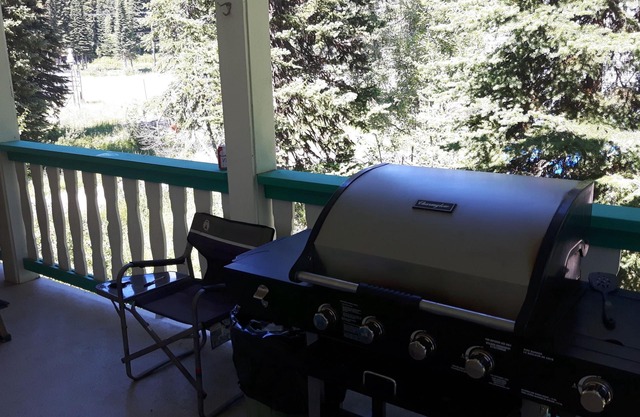 Entire Chalet with Private Hot Tub and BBQ. Steps from the village and pond