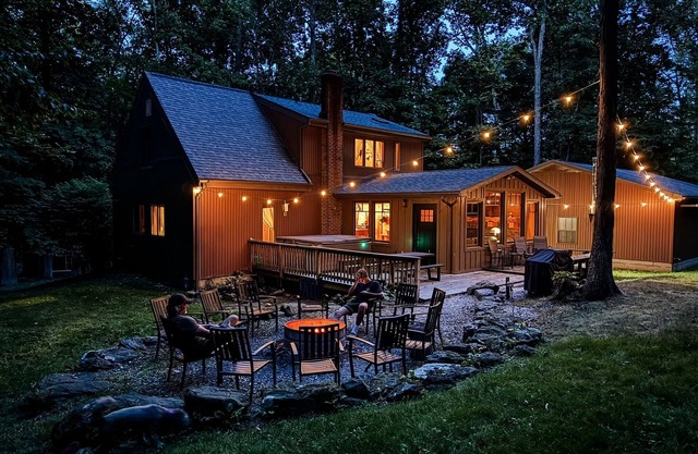Escape to the wood—featuring hot tub, private trails, fire pit, peaceful seclusion. Dogs welcome.