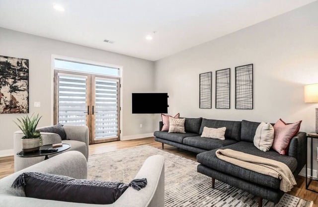 Evelyn 202: Spacious Downtown Retreat with Private Deck & Balcony