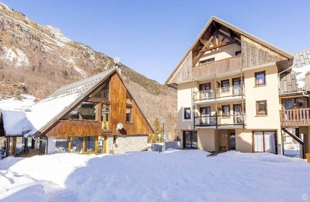 Experience Alpine Serenity: Modern Living Amidst Majestic Mountain Scenery