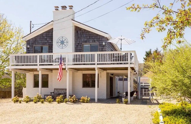 Experience quaint seaside living in this charming Montauk home with a Lux.
