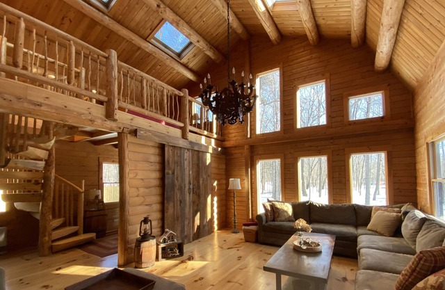 Exquisite beach front log home on Saco River