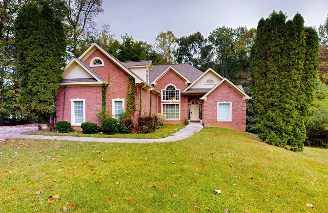 Exquisite home with charming deck, washer/dryer, & central AC