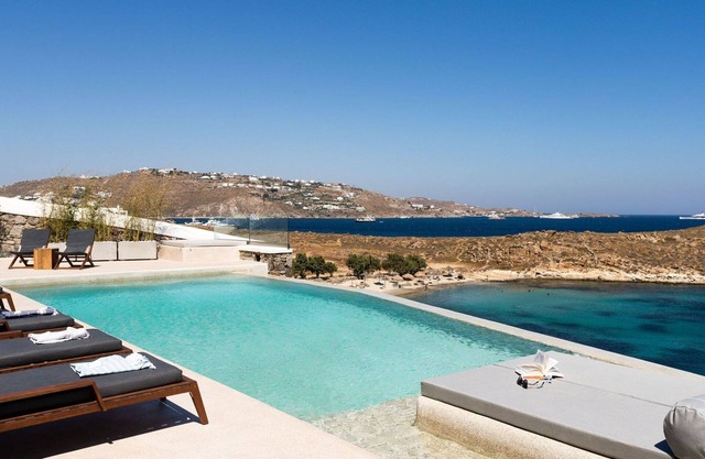 Exquisite Mykonos Villa | Villa On The Rocks | 6 Bedroom | Infinity Pool |.