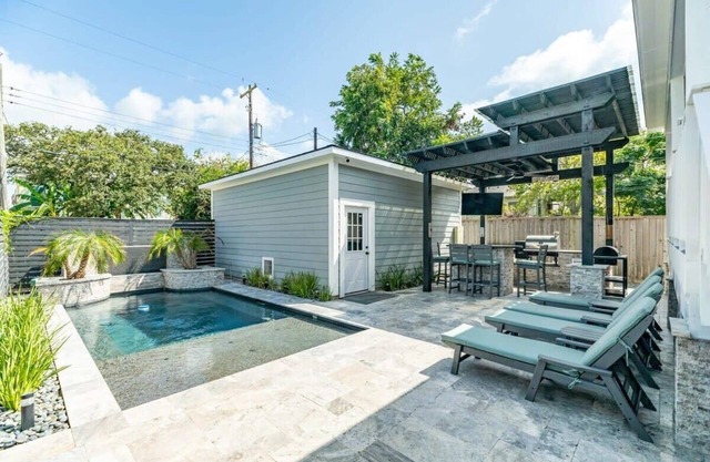 Exudes the Posh Life! Heated Pool, Fireplace & Stunning!