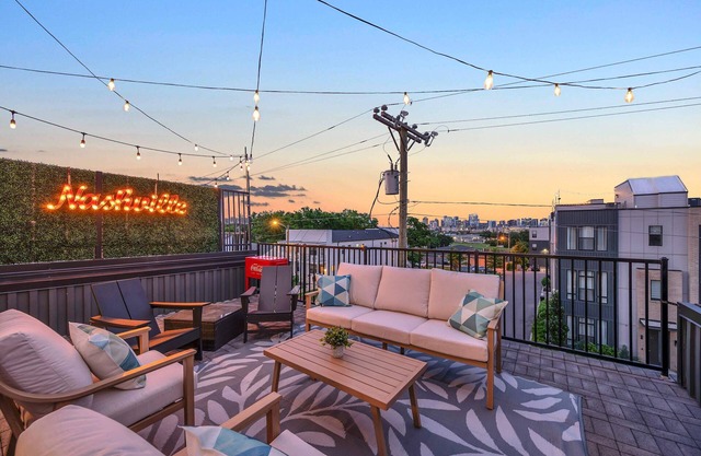 Fall rooftop deck, karaoke room, skyline views near Broadway