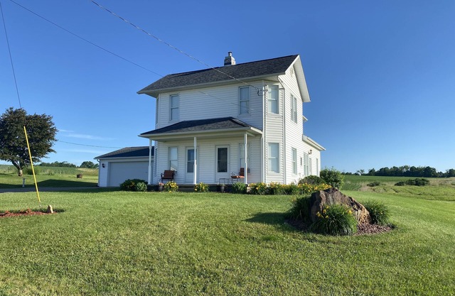 Family owned and operated spacious Farm House with a modern decorative flair.