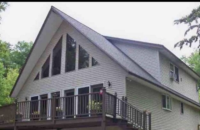 Family Retreat! Large Game Room, fenced in yard with hot tub and fire pit.