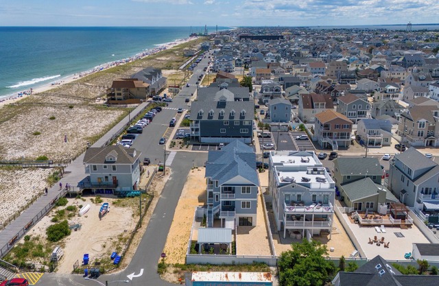 FAMILY TIDES - sweeping ocean views from a 4 BR home -steps from beach and shops