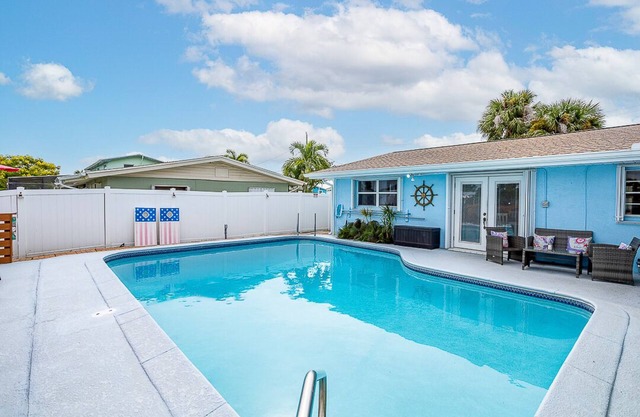 Family Vacation Home with pool, canal access for fishing or kayak with dolphins