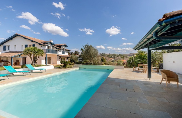 Family villa with pool, walking distance to the beach