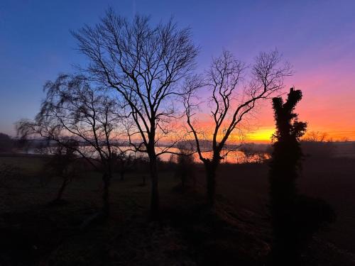 Ferienwohnung mit See und Alpenblick