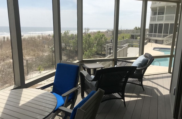 First Floor Beachfront condo with direct access to the pool and beach walkway.