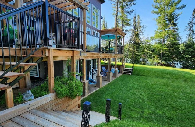 Fox Lakehouse is a contemporary four season home with amazing walk in beach.