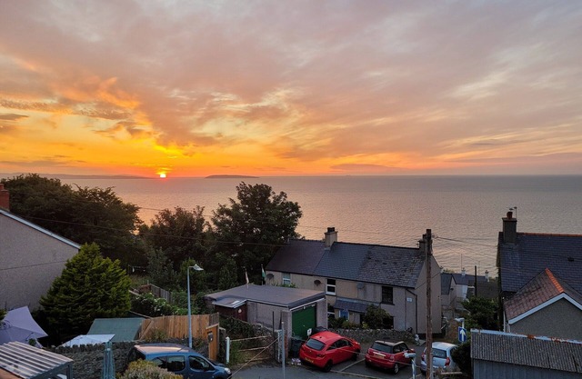 Franny’s Cottage occupies an enviable elevated position with sea views over to Puffin Island and Ang
