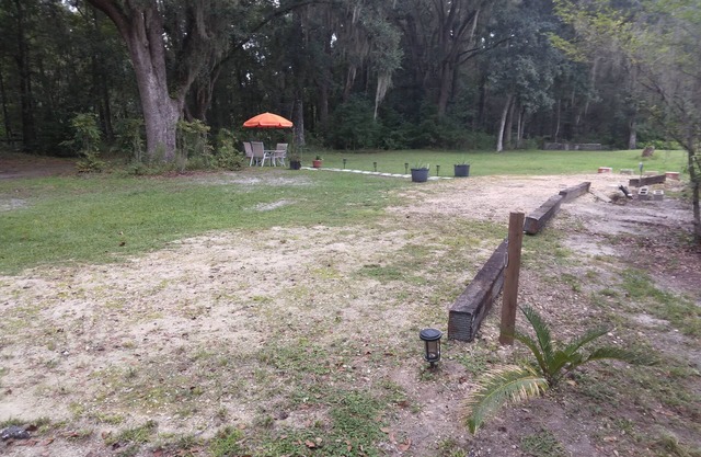 Full hook up RV Trailer site on private 1 acre Conveniently located