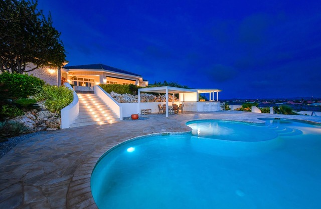 Full outdoor kitchen experience with breathtaking ocean view