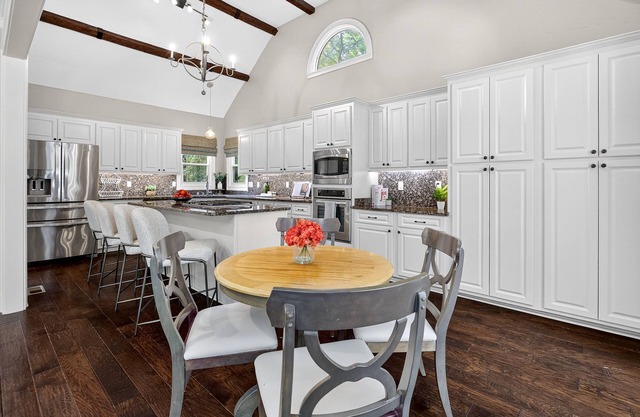 Fully equipped gourmet kitchen, vaulted ceilings, fire places, fire pit & grills