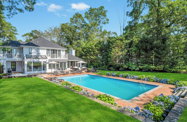 Fully Renovated and Re-Designed Water Mill Home with Sweeping Horse Farm.