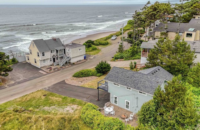 Fully Updated Lincoln City Cottage with Ocean Views has Patio, Decks, Fire Pit!