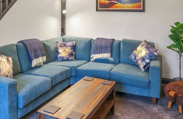 A charming cottage with distant sea views, in a peaceful setting.