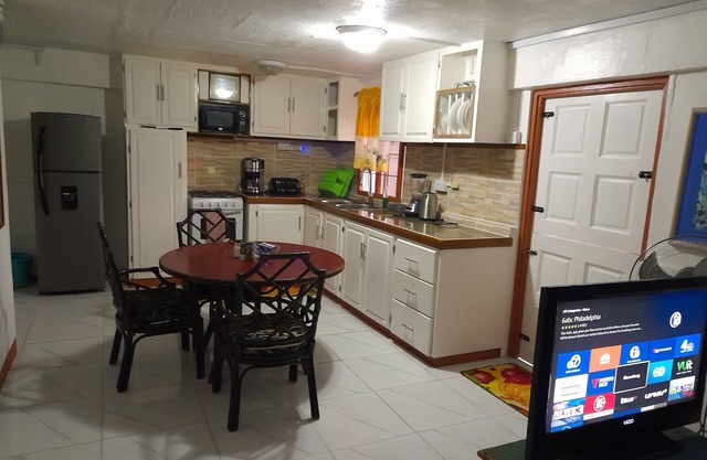 Caribbean house 3 mins walk to the marina and port.n
