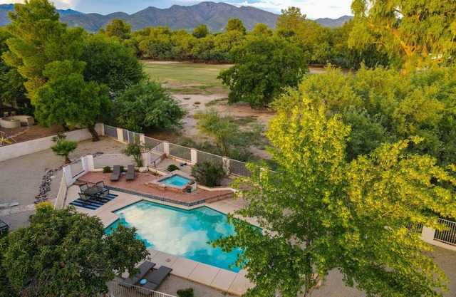 Golf course-front home with private heated pool, spa, mtn views, golf on site
