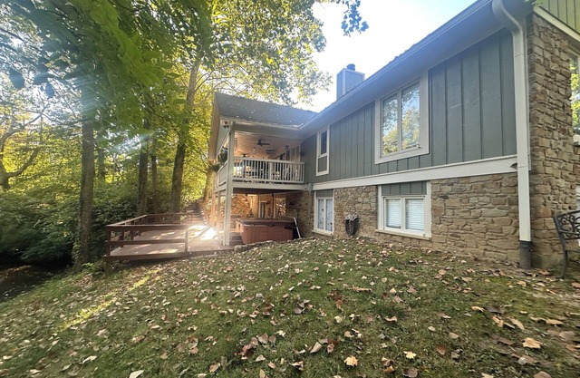 Gorgeous 4-bedroom home on 2-acre wooded lot w/creek, 8 miles south of downtown