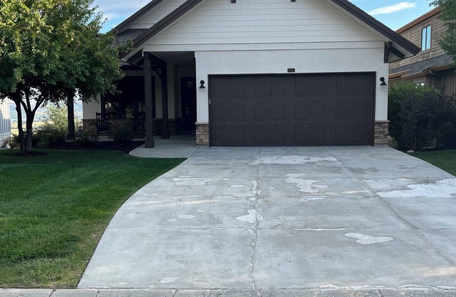 Gorgeous 5 bedroom 4.5 bath home with incredible mountain and lake views.