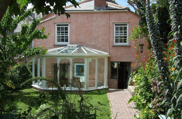 Gorgeous artist's cottage with secluded garden and sea views from all rooms.