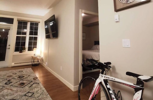 Gorgeous Elbow River and City View Condo - Minutes Away From Stampede!