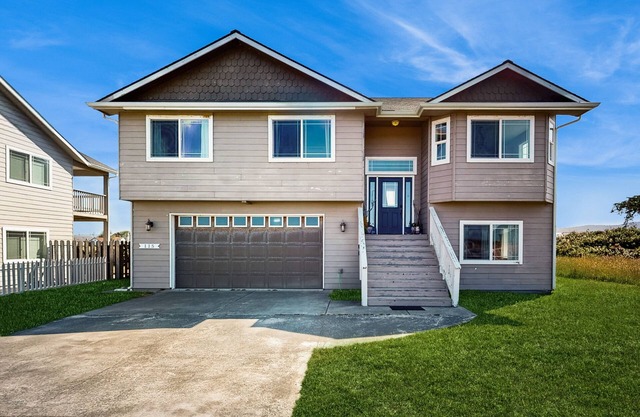 Gorgeous home w/the ocean & beach just beyond your front door