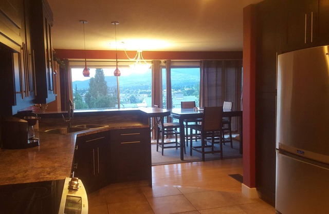Gourmet kitchen, luxurious bath A/C, gas fireplace, BBQ & private backyard patio