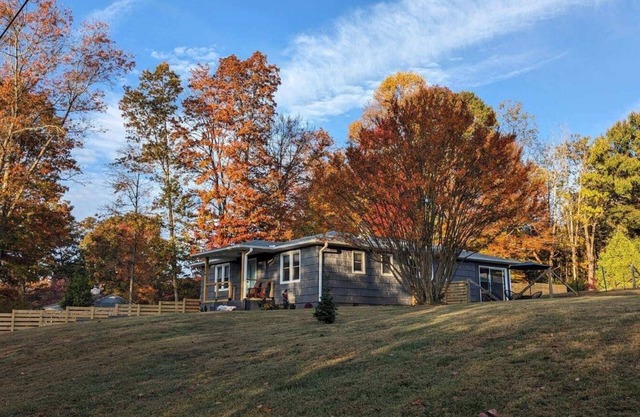 Grovemont Retro Retreat A pet-friendly home in Asheville, with a fenced yard & fire pit.