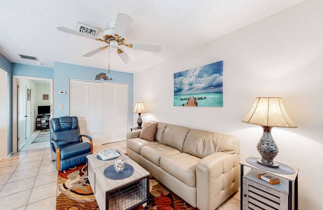 Gulf-view condo with pool, grill access, balcony, washer/dryer & central AC