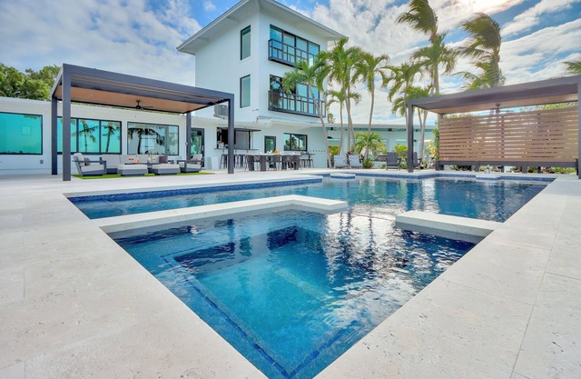 Gulfside Waterfront Luxe Estate w/private beach, pool, spa, boat dockage