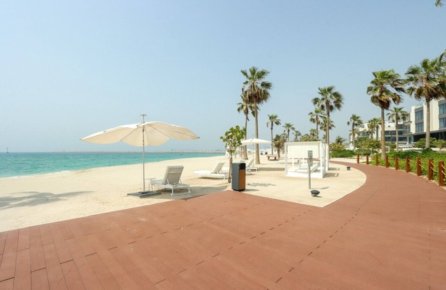 High-end Beachfront 4BR Duplex with Patio Sea and Burj View